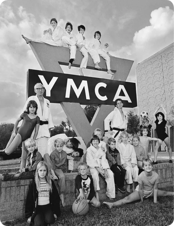 YMCA sign with kids